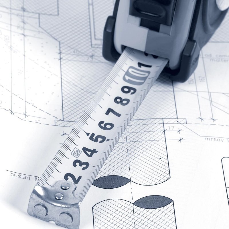 Measuring Tape On Home-Renovation Schematics